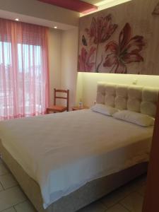Letto o letti in una camera di Xenios Zeus