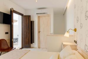 Postel nebo postele na pokoji v ubytování Hostal Peñiscola