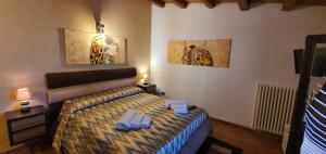 A bed or beds in a room at VILLA MARIANNA CON PISCINA PRIVATA ampi spazi esterni e WIFI FREE