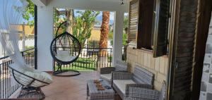 A seating area at VILLA MARIANNA CON PISCINA PRIVATA ampi spazi esterni e WIFI FREE