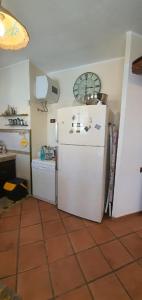 A kitchen or kitchenette at VILLA MARIANNA CON PISCINA PRIVATA ampi spazi esterni e WIFI FREE