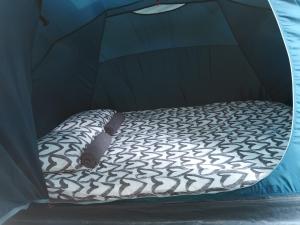 מיטה או מיטות בחדר ב-ECO Camp Supot