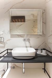 Koupelna v ubytování San Sebastiano Suite & Luxury Apartments