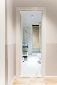 Koupelna v ubytování San Sebastiano Suite & Luxury Apartments