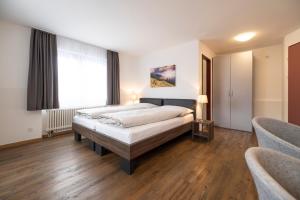 Postel nebo postele na pokoji v ubytování Hotel Restaurant Alte Brauerei