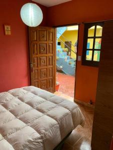 Postel nebo postele na pokoji v ubytování Malecon en calle Techada Hostel