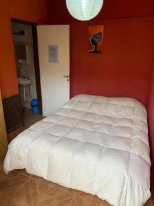Postel nebo postele na pokoji v ubytování Malecon en calle Techada Hostel