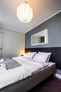 Postel nebo postele na pokoji v ubytování Hotel Marino