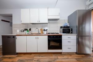 Kuchyň nebo kuchyňský kout v ubytování Apartments Šćerbe 3103