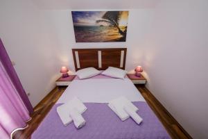 Postel nebo postele na pokoji v ubytování Apartments Šćerbe 3103