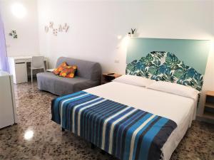 Postel nebo postele na pokoji v ubytování A Polignano Rooms