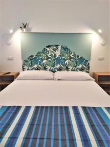 Postel nebo postele na pokoji v ubytování A Polignano Rooms