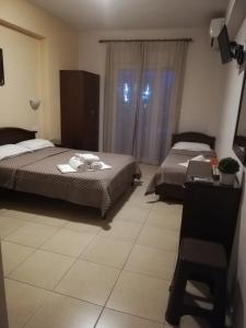 Posteľ alebo postele v izbe v ubytovaní Denis Studios and Apartments