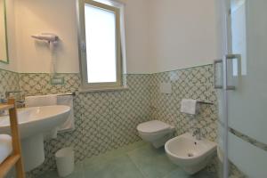 Koupelna v ubytování Acquadamare B&B