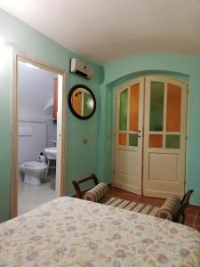 Katil atau katil-katil dalam bilik di Casa Cossu