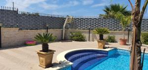 The swimming pool at or close to VILLA MARIANNA CON PISCINA PRIVATA ampi spazi esterni e WIFI FREE