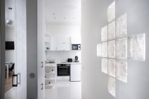 Kuchyňa alebo kuchynka v ubytovaní Forrás Apartman