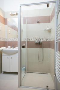 Kúpeľňa v ubytovaní Forrás Apartman