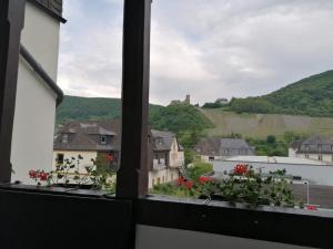 a view from a window of a town at Mosel-Ferienwohnung Bewo in Bernkastel-Kues +4 photos