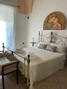 Postel nebo postele na pokoji v ubytování Donna Concetta casa vacanze