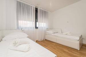 Postel nebo postele na pokoji v ubytování Holiday House Sukošan Zadar + 33 fotografií