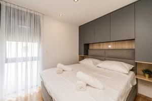 Postel nebo postele na pokoji v ubytování Holiday House Sukošan Zadar
