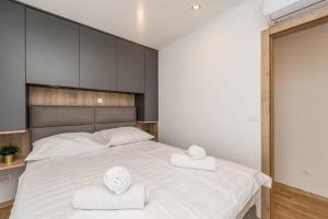 Postel nebo postele na pokoji v ubytování Holiday House Sukošan Zadar