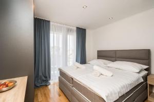 Postel nebo postele na pokoji v ubytování Holiday House Sukošan Zadar