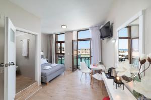 Imagen de la galería de Faros Rooms & Suites, en Rethymno