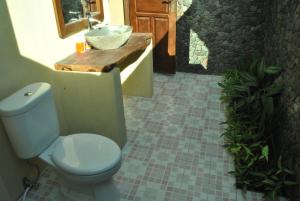 Koupelna v ubytování Pondok Rahayu Guest House