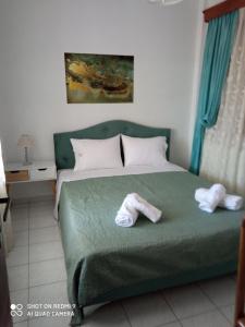 Postel nebo postele na pokoji v ubytování Annas apartment 2 (AgiosNikolaos)