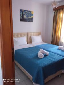 Postel nebo postele na pokoji v ubytování Annas apartment 2 (AgiosNikolaos)