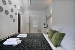 Łóżko lub łóżka w pokoju w obiekcie Apartamenty Prestige Browar Lubicz Stare Miasto