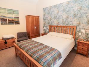 Cama o camas de una habitación en Hemmel Cottage