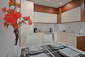 Kuchnia lub aneks kuchenny w obiekcie Apartamenty Prestige Browar Lubicz Stare Miasto