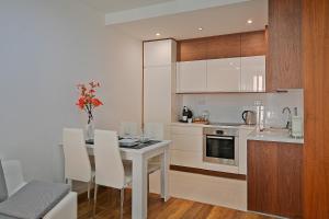 Kuchnia lub aneks kuchenny w obiekcie Apartamenty Prestige Browar Lubicz Stare Miasto