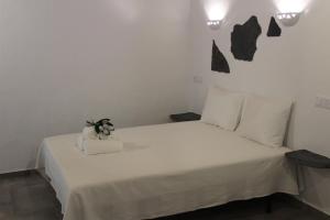 Voodi või voodid majutusasutuse Quinta do Grande Lago toas
