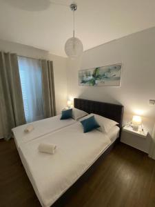 Una cama o camas en una habitación de Villa Moon Trogir