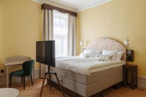 Postel nebo postele na pokoji v ubytování Hotel Ruth, WorldHotels Crafted