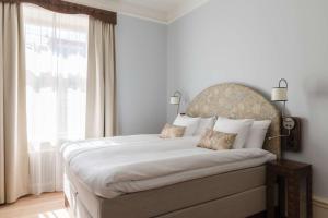 Postel nebo postele na pokoji v ubytování Hotel Ruth, WorldHotels Crafted