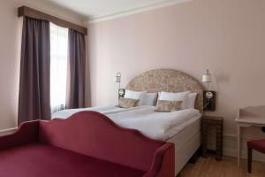 Postel nebo postele na pokoji v ubytování Hotel Ruth, WorldHotels Crafted