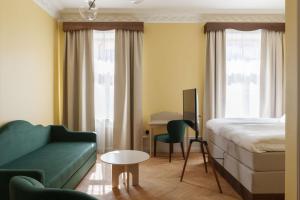 Postel nebo postele na pokoji v ubytování Hotel Ruth, WorldHotels Crafted