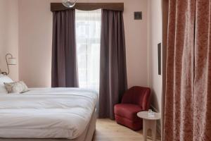 Postel nebo postele na pokoji v ubytování Hotel Ruth, WorldHotels Crafted