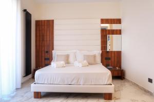 Postel nebo postele na pokoji v ubytování B&B BorgiaRooms