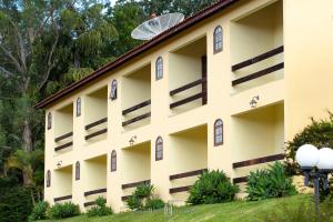 an exterior view of a building at Hotel Fazenda Colina in Ouro Fino