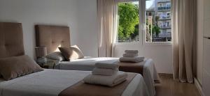 Postel nebo postele na pokoji v ubytování Cor de Vinaròs