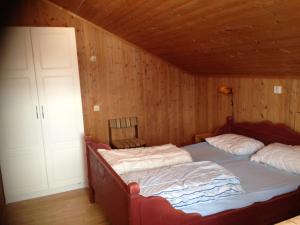 
Säng eller sängar i ett rum på Bessheim Fjellstue og Hytter
