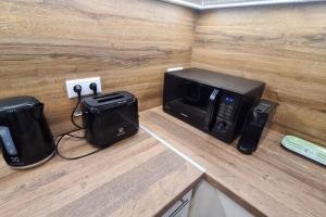 Kuchyň nebo kuchyňský kout v ubytování Kadarka apartman - Szekszárd
