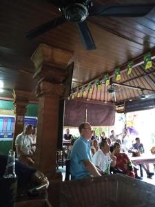 a group of people sitting in a restaurant at Bali Senia Hotel in Sanur