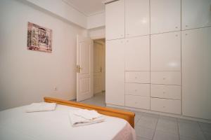 Postel nebo postele na pokoji v ubytování Villa Georgia
